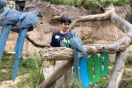 A Unity student pictured with exotic birds
